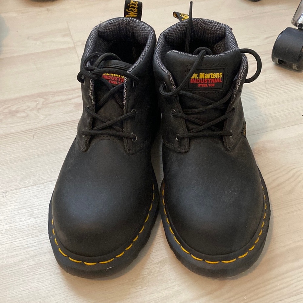 Dr. Martens black steel toe boots. NEVER WORN